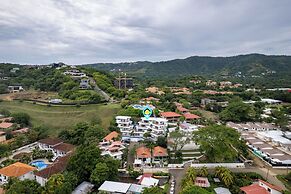 Modern Top-Floor Condo with Panoramic Views and Community Pool