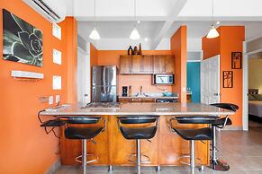 Modern Top-Floor Condo with Panoramic Views and Community Pool