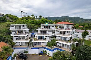 Modern Top-Floor Condo with Panoramic Views and Community Pool