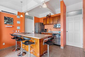 Modern Top-Floor Condo with Panoramic Views and Community Pool