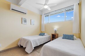 Modern Top-Floor Condo with Panoramic Views and Community Pool