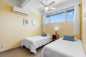 Modern Top-Floor Condo with Panoramic Views and Community Pool