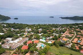 Modern Top-Floor Condo with Panoramic Views and Community Pool