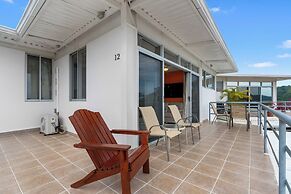 Modern Top-Floor Condo with Panoramic Views and Community Pool