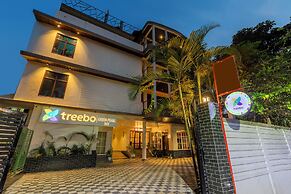 Treebo Green Pearl Inn