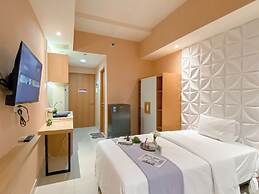 Peach Tone Studio At Evenciio Margonda Apartment