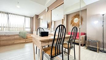 Earth Toned Studio Apartment Collins Boulevard