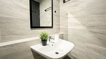 Earth Toned Studio Apartment Collins Boulevard