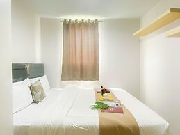 Simple 2Br At Azalea Suites Apartment