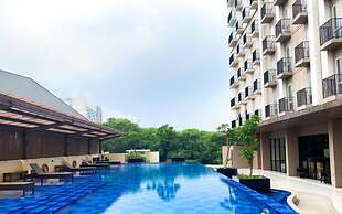 Simple 2Br At Azalea Suites Apartment