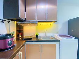 Simple 2Br At Azalea Suites Apartment