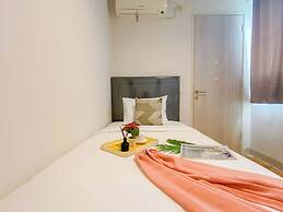 Simple 2Br At Azalea Suites Apartment