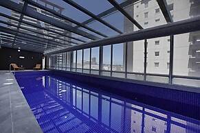 Comfy & Stylish 2BR Apt Next to Crown, City Views