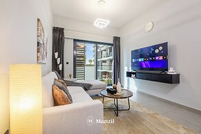Manzil-Stylish 1BR with Maid room in JVC