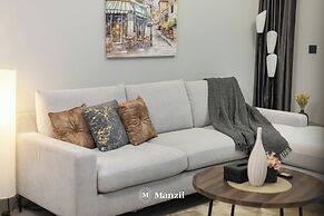 Manzil-Stylish 1BR with Maid room in JVC