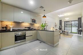 Manzil-Stylish 1BR with Maid room in JVC