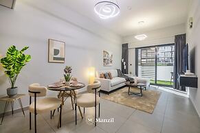 Manzil-Stylish 1BR with Maid room in JVC