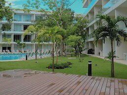 Stylish Playacar Condos w Balcony & Pool