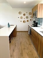 Stylish Playacar Condos w Balcony & Pool