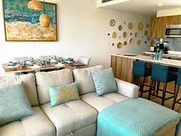 Stylish Playacar Condos w Balcony & Pool