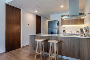 Stylish Playacar Condos w Balcony & Pool