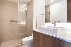 Stylish Playacar Condos w Balcony & Pool