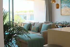 Stylish Playacar Condos w Balcony & Pool