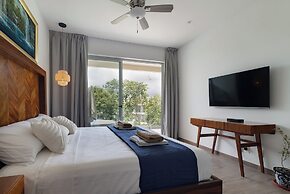 Stylish Playacar Condos w Balcony & Pool