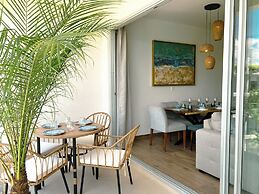 Stylish Playacar Condos w Balcony & Pool