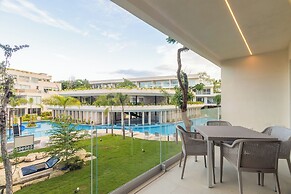 Stylish Playacar Condos w Balcony & Pool