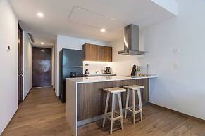 Stylish Playacar Condos w Balcony & Pool