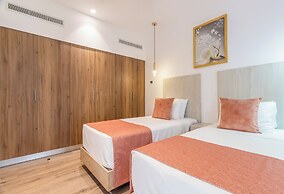 Stylish Playacar Condos w Balcony & Pool