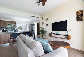 Stylish Playacar Condos w Balcony & Pool
