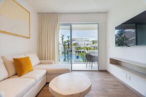 Stylish Playacar Condos w Balcony & Pool