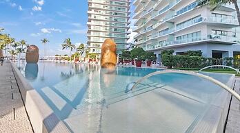 Beachfront 1 BR Condo With Multiple Pools - Gym
