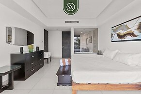 Beachfront 1 BR Condo With Multiple Pools - Gym