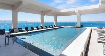 Elegant 1 BR Condo - Beachfront - Pools - King