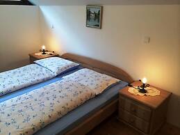 Apartmaji Pod macesnovo streho