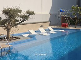Manzil- Chic 2BR w Pool nr Circle Mall