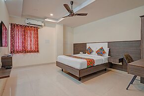 Fabhotel Sapthagiri Suites Inn