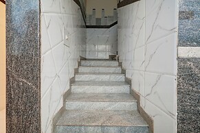 Fabhotel Sapthagiri Suites Inn