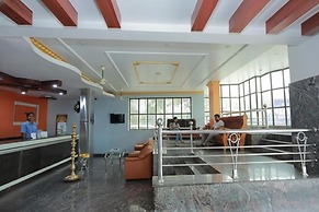 Fabhotel Amutham Residency