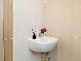 Warm Minimalist Studio Apartment Near Paramadina University At Meikart