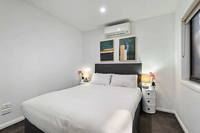 Comfortable 2BR Retreat With Balcony & Parking