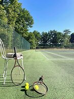 Maison piscine & tennis partagés