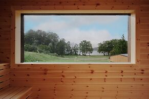 Raus | Cabins am See mit Sauna + Hot-Tub