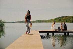 Raus | Cabins am See mit Sauna + Hot-Tub