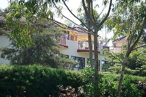ENZOGU GARDENS RESIDENCY HOTEL