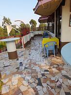 ENZOGU GARDENS RESIDENCY HOTEL