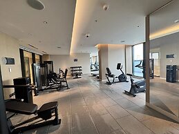 Premium 1BR Oasis - City Views & Pool